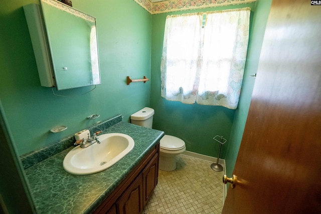 109 Mcrae St, Columbia, SC 29203 - half bath with toilet, vanity, and tile patterned floors