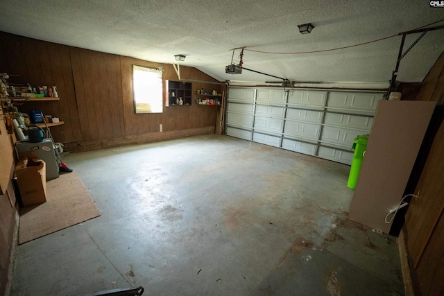 109 Mcrae St, Columbia, SC 29203 - garage featuring a garage door opener and wooden walls