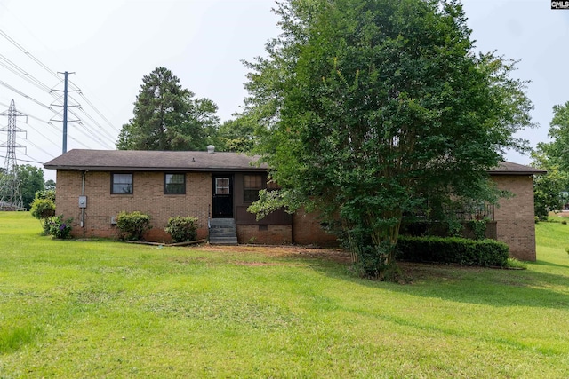 109 Mcrae St, Columbia, SC 29203 - view of front of home featuring brick siding, a front lawn, crawl space, and entry steps