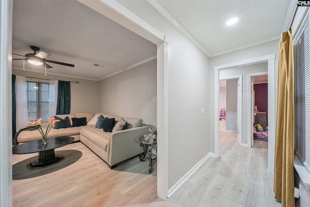 1 Rockingham Ct, Columbia, SC 29223 - living room featuring light wood-type flooring, a ceiling fan, ornamental molding, and baseboards