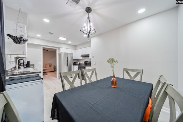 1 Rockingham Ct, Columbia, SC 29223 - dining area with light wood-style flooring and recessed lighting