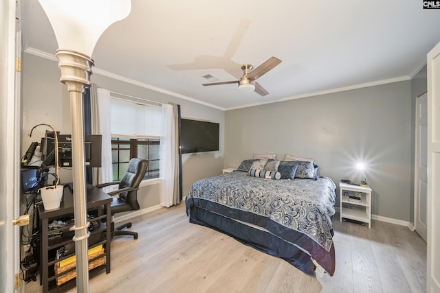 1 Rockingham Ct, Columbia, SC 29223 - bedroom featuring baseboards, wood finished floors, ornamental molding, ornate columns, and ceiling fan