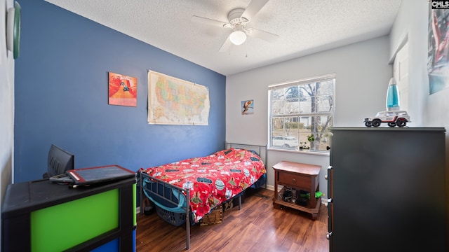 530 Pin Oak Dr, Lexington, SC 29073 - bedroom featuring wood finished floors, a textured ceiling, and a ceiling fan