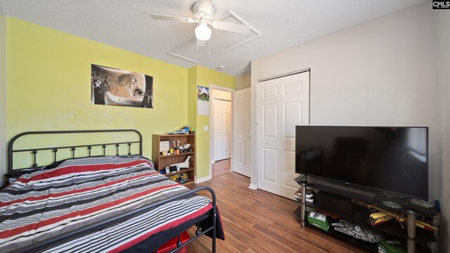 530 Pin Oak Dr, Lexington, SC 29073 - bedroom with wood finished floors, attic access, ceiling fan, and baseboards