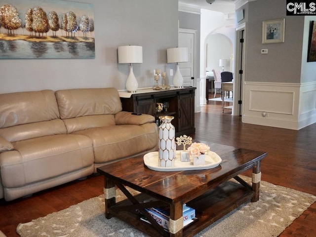 522 Meadow Grass Ln, Lexington, SC 29072 - living area featuring arched walkways, wood finished floors, a wainscoted wall, and ornamental molding