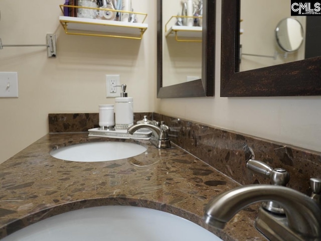 522 Meadow Grass Ln, Lexington, SC 29072 - bathroom featuring double vanity and tasteful backsplash