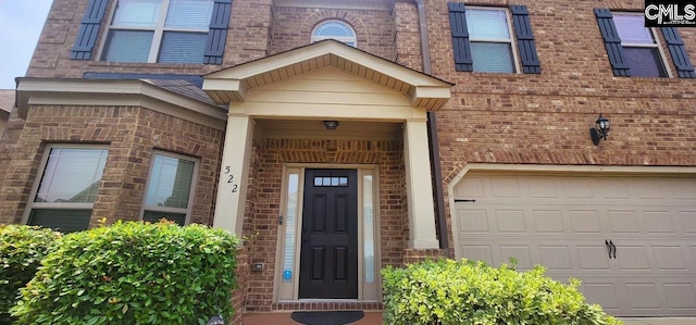 522 Meadow Grass Ln, Lexington, SC 29072 - doorway to property with brick siding and a garage
