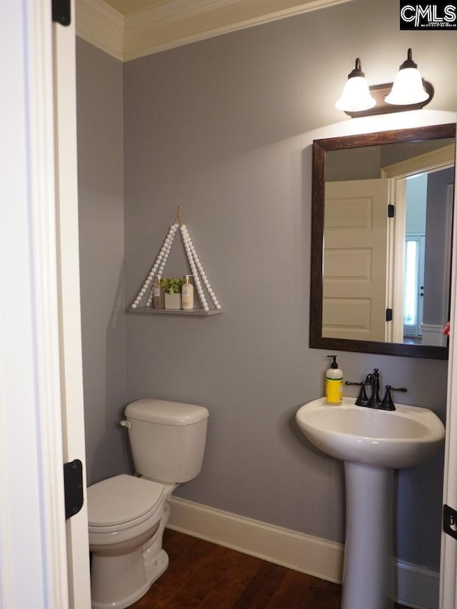 522 Meadow Grass Ln, Lexington, SC 29072 - half bath featuring baseboards, toilet, wood finished floors, and crown molding