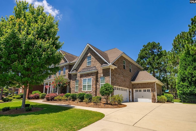 215 Peninsula Way, Columbia, SC 29229 - craftsman house featuring concrete driveway, brick siding, stone siding, and a garage