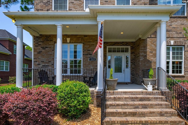 215 Peninsula Way, Columbia, SC 29229 - view of exterior entry with brick siding and a porch