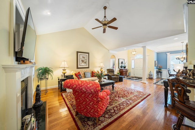 55 Hickory Woods Ct, Columbia, SC 29223 - living room featuring a ceiling fan, ornate columns, a fireplace, wood-type flooring, and lofted ceiling