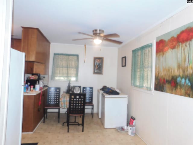 572 National St, Sumter, SC 29150 - dining area featuring a ceiling fan and light flooring