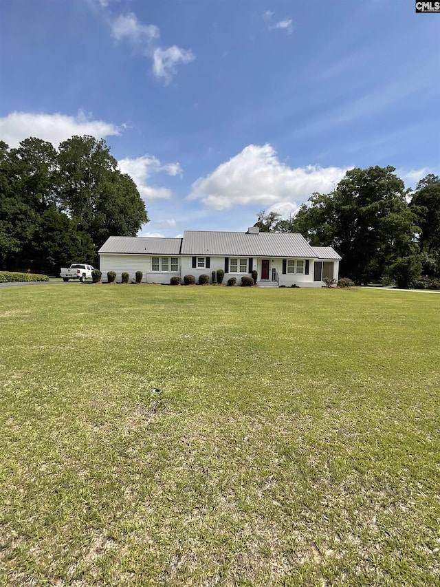 150 Azalea Ave, Bamberg, SC 29003 - ranch-style house featuring a front yard and metal roof