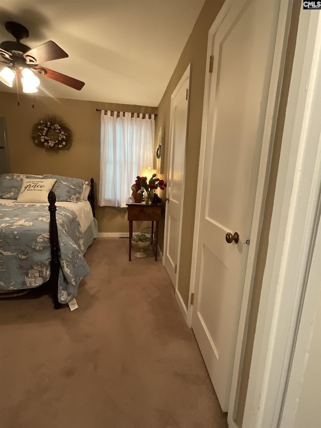 150 Azalea Ave, Bamberg, SC 29003 - bedroom featuring light carpet, baseboards, and a ceiling fan