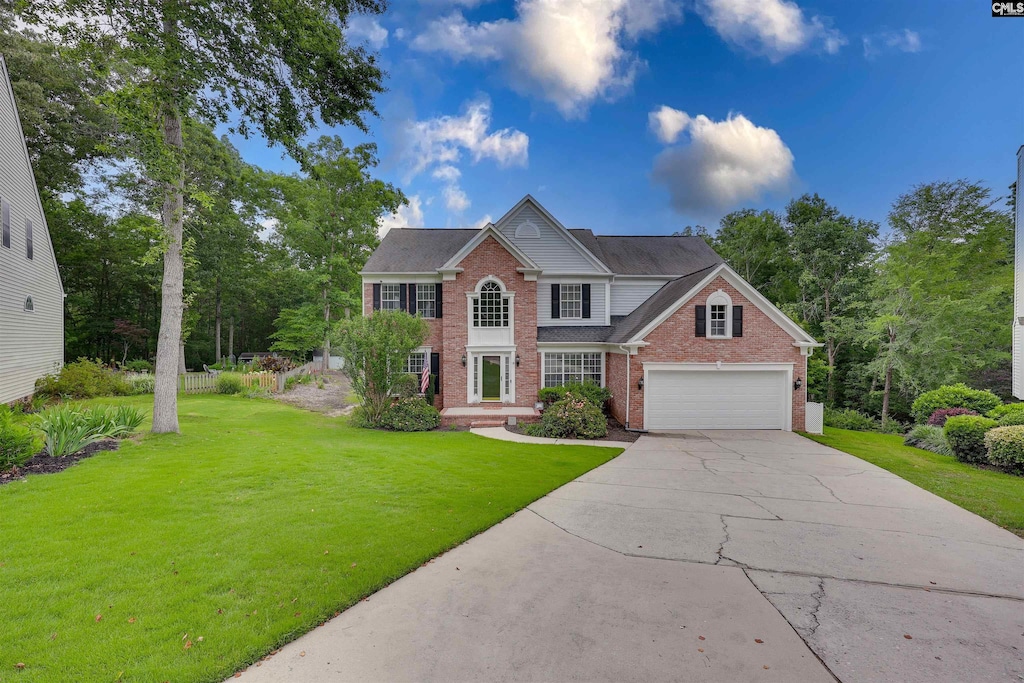 10 Queen Oak Ct, Irmo, SC 29063 - view of front of property featuring brick siding, concrete driveway, a front lawn, and an attached garage