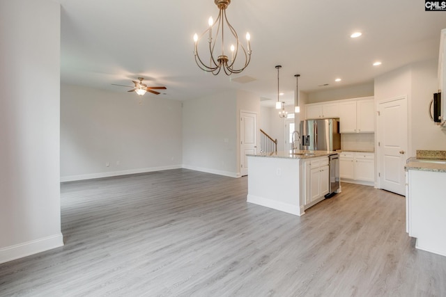 412 Blue Robin Ln, Columbia, SC 29210 - kitchen with stainless steel appliances, a sink, a ceiling fan, a chandelier, and recessed lighting