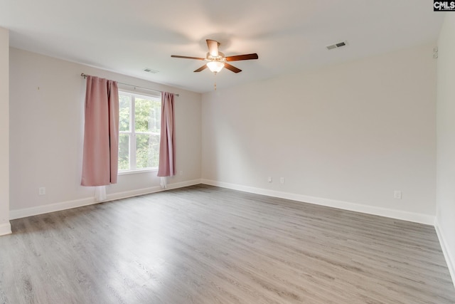412 Blue Robin Ln, Columbia, SC 29210 - empty room featuring a ceiling fan, wood finished floors, and baseboards