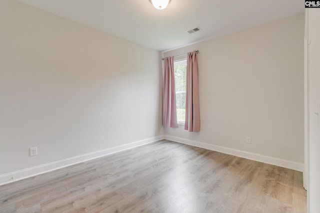 412 Blue Robin Ln, Columbia, SC 29210 - unfurnished room featuring light wood finished floors and baseboards
