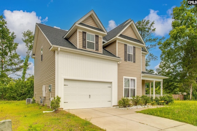 412 Blue Robin Ln, Columbia, SC 29210 - view of front of home with concrete driveway, central air condition unit, a garage, a front lawn, and a shingled roof