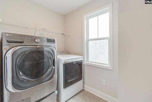 412 Blue Robin Ln, Columbia, SC 29210 - laundry room with independent washer and dryer, healthy amount of natural light, and baseboards