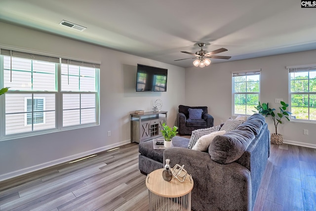 2426 Trakand Dr, Lexington, SC 29073 - living room featuring wood finished floors, baseboards, and a ceiling fan