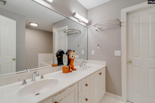 311 Hillridge Way, Columbia, SC 29229 - full bath featuring double vanity, a garden tub, baseboards, and tile patterned flooring