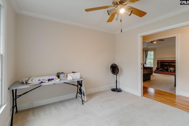 311 Hillridge Way, Columbia, SC 29229 - carpeted office featuring crown molding, a ceiling fan, baseboards, and a brick fireplace