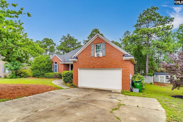 311 Hillridge Way, Columbia, SC 29229 - traditional-style house featuring brick siding, concrete driveway, a garage, and a front yard