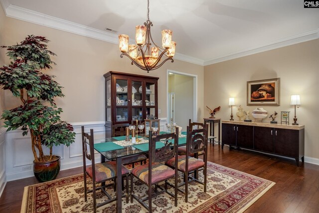 605 Scarlet Baby Dr, Blythewood, SC 29016 - dining room featuring a chandelier, crown molding, and dark wood finished floors