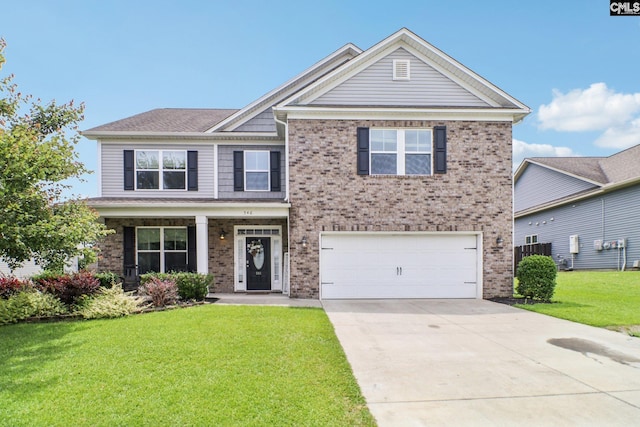 546 Caladium Way, Columbia, SC 29229 - view of front of property with an attached garage, a front yard, brick siding, and concrete driveway