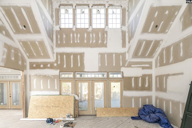 88C Tombfield Rd, Camden, SC 29020 - foyer with french doors, a towering ceiling, and hardwood / wood-style floors