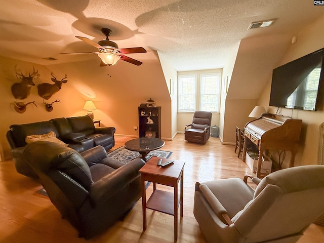 213 River Xing, Lexington, SC 29072 - living room featuring a textured ceiling, ceiling fan, and light wood-style floors