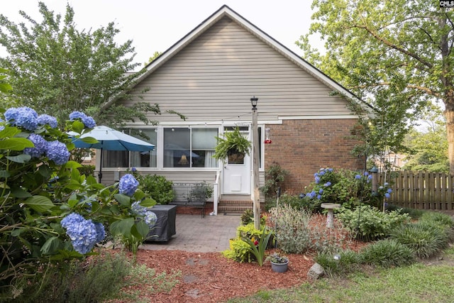 213 River Xing, Lexington, SC 29072 - back of house featuring brick siding, entry steps, and a patio