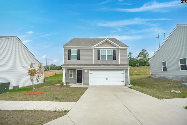 313 Greenwood Valley Ct, Elgin, SC 29045 - view of front of home with a garage, driveway, a front yard, and a shingled roof