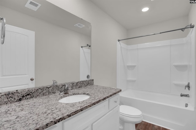 313 Greenwood Valley Ct, Elgin, SC 29045 - full bath featuring vanity, wood finished floors, shower / bath combination, toilet, and recessed lighting