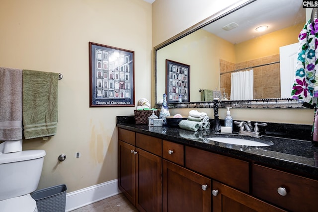 237 Peninsula Way, Columbia, SC 29229 - full bath featuring baseboards, toilet, vanity, a tile shower, and tile patterned flooring