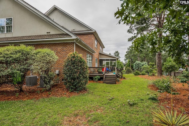 237 Peninsula Way, Columbia, SC 29229 - view of grassy yard with a sunroom, a deck, and cooling unit