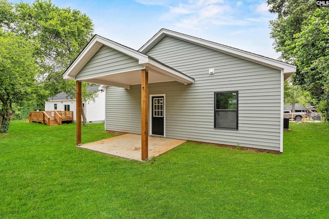 3723 Hoyt St, Columbia, SC 29223 - rear view of property featuring a patio area, a lawn, and a wooden deck