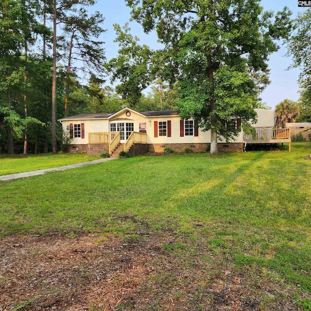 137 Breezy Bay Cir, Gilbert, SC 29054 - view of front of home featuring crawl space, a deck, and a front lawn