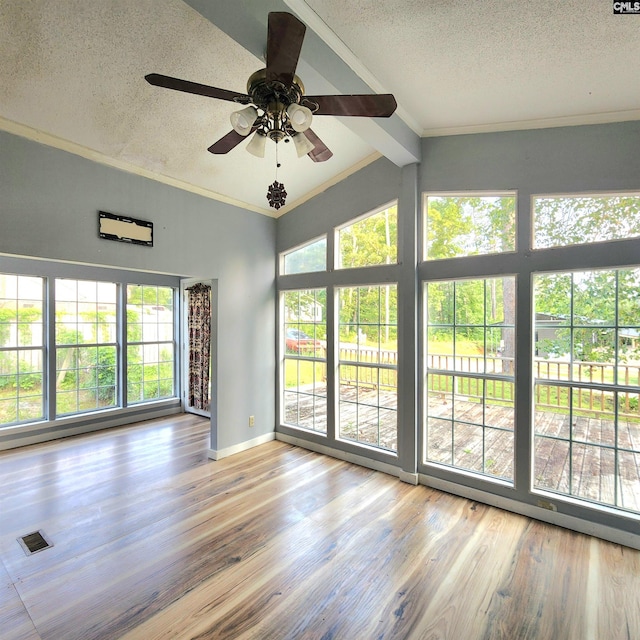 137 Breezy Bay Cir, Gilbert, SC 29054 - spare room featuring a textured ceiling, beam ceiling, wood finished floors, a ceiling fan, and baseboards