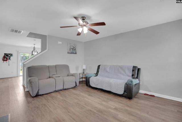 73 Mayapple Dr, Lexington, SC 29073 - living area featuring wood finished floors, ceiling fan, and baseboards