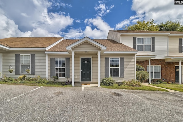2000 Water Oak Dr Unit 6B, Lexington, SC 29072 - view of front of house with uncovered parking and a shingled roof