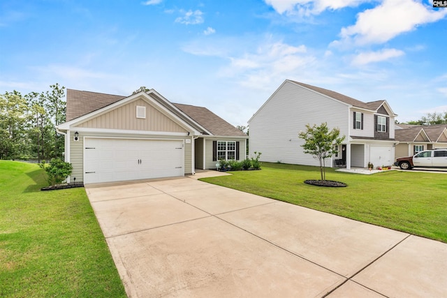 254 Sundew Rd, Elgin, SC 29045 - view of front of property featuring a front lawn, concrete driveway, an attached garage, board and batten siding, and roof with shingles