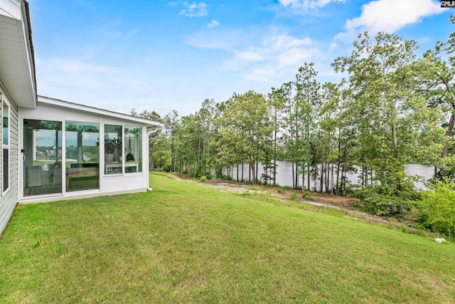 254 Sundew Rd, Elgin, SC 29045 - view of grassy yard featuring a sunroom
