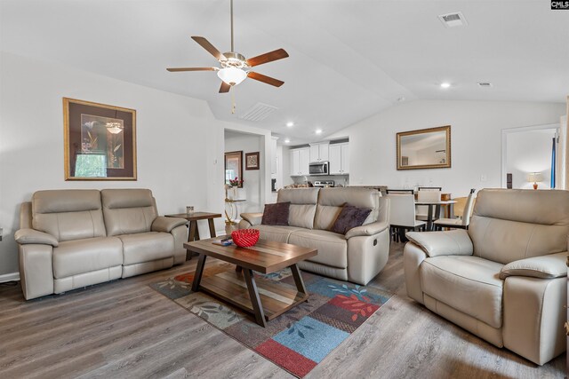 254 Sundew Rd, Elgin, SC 29045 - living area with wood finished floors, vaulted ceiling, ceiling fan, and recessed lighting