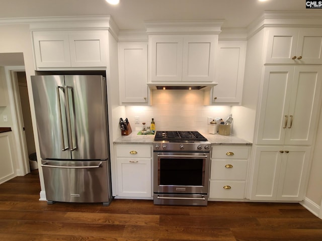2003 Springdale Dr, Camden, SC 29020 - kitchen featuring appliances with stainless steel finishes, backsplash, white cabinets, and recessed lighting