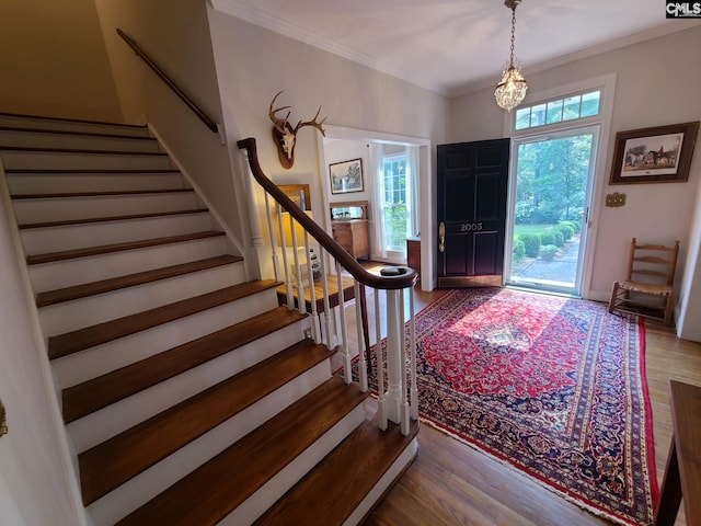 2003 Springdale Dr, Camden, SC 29020 - entryway featuring stairs, wood finished floors, ornamental molding, and a chandelier