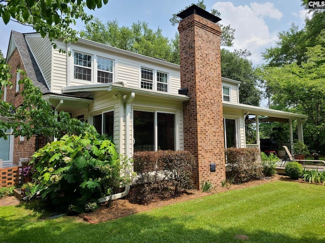 2003 Springdale Dr, Camden, SC 29020 - back of property featuring a yard and a chimney