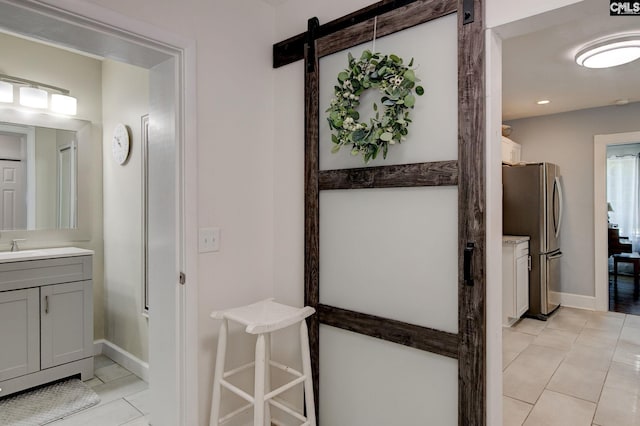 4524 Mosshill Rd, Columbia, SC 29206 - bathroom with tile patterned floors, vanity, baseboards, and recessed lighting