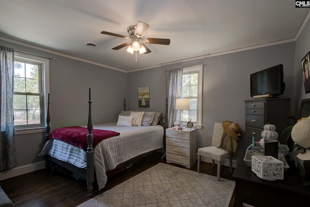 4524 Mosshill Rd, Columbia, SC 29206 - bedroom with wood finished floors, multiple windows, baseboards, ornamental molding, and a ceiling fan